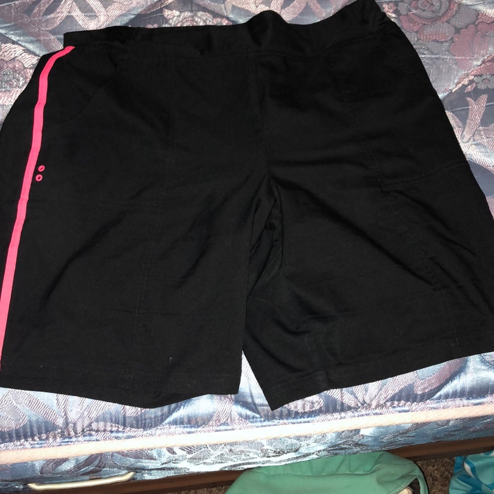 Black and pink mid length shorts!